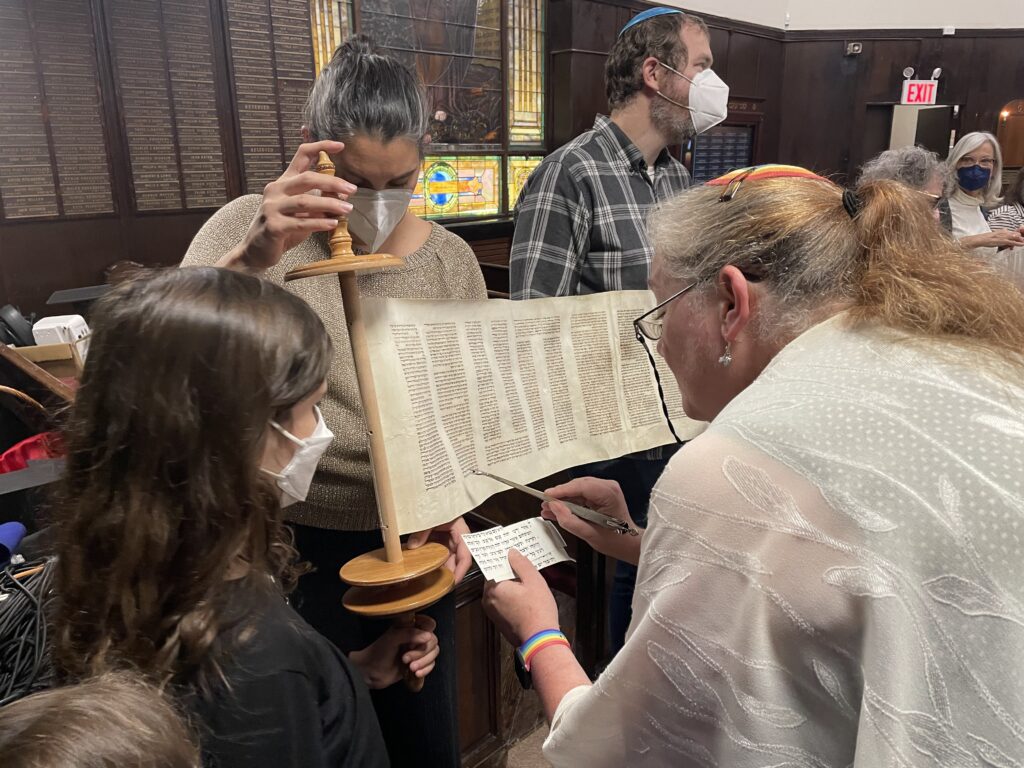 Rabbi reading Torah