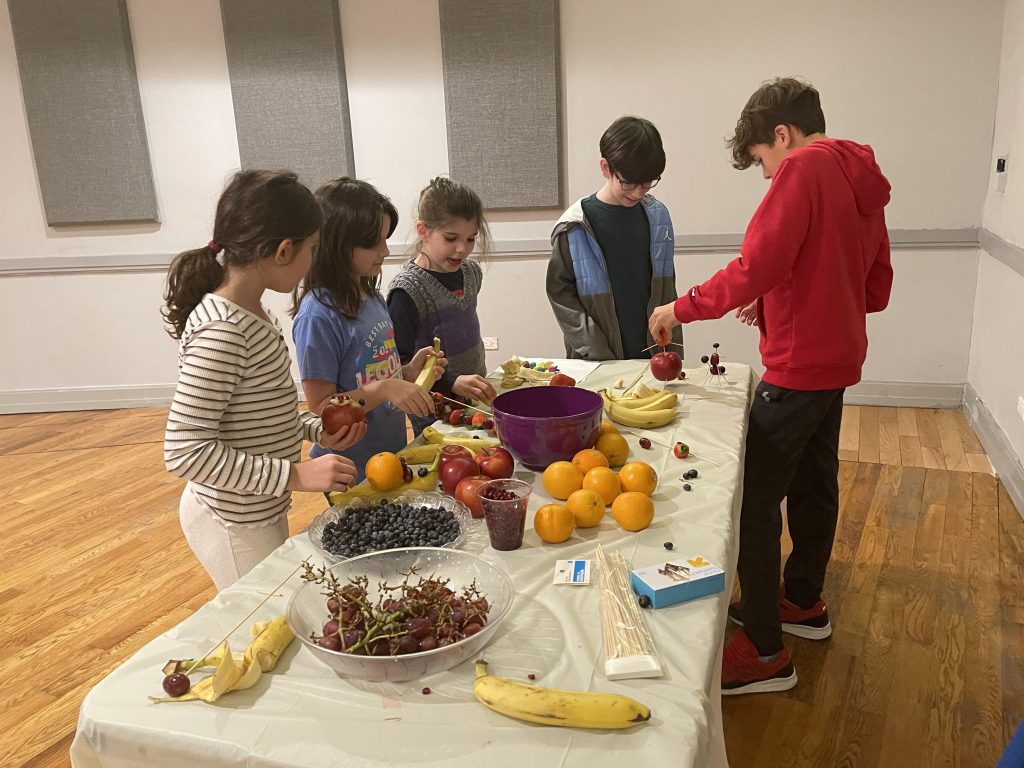 Students at the Tu B'Shevat Seder